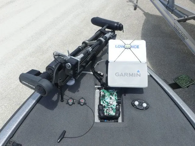 Slide: The Image of 2022 Falcon F21 TE boat with Lowrance and Garmin equipment. - 13