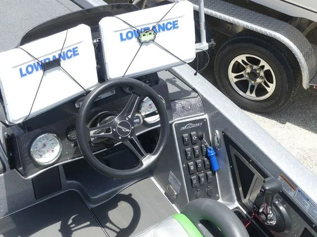 Slide: The Image of Interior view of a 2022 Falcon Bass Boats F21 TE cockpit. - 16