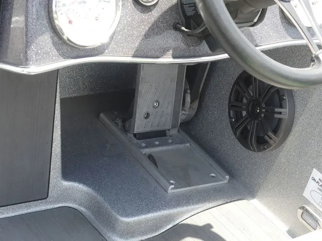 Slide: The Image of Interior of Falcon Bass Boats F21 TE 2022 with steering console. - 17