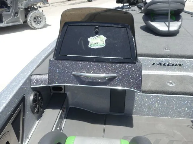 Slide: The Image of 2022 Falcon Bass Boats F21 TE interior with control console. - 18