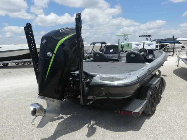 Slide: The Image of 2022 Falcon Bass Boats F21 TE in a parking lot. - 4