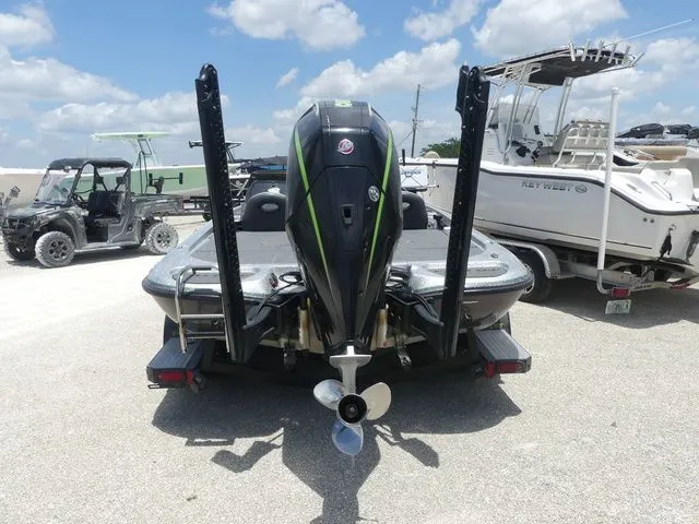 Slide: The Image of 2022 Falcon F21 TE bass boat rear view in marina. - 5