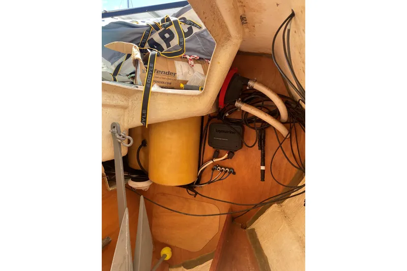 Slide: The Image of Interior view of a 2002 Beneteau Oceanis Clipper 361 sailboat, showing equipment and storage. - 36
