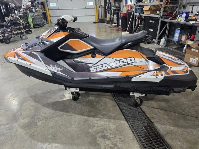 The Image of 2017 Sea-Doo SPARK 2-up jet ski in workshop. - 1