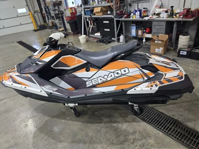Slide: The Image of 2017 Sea-Doo SPARK 2-up jet ski in workshop. - 8