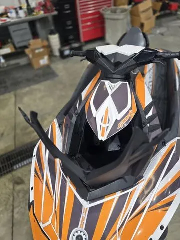 Slide: The Image of 2017 Sea-Doo SPARK 2-up jet ski in garage. - 9
