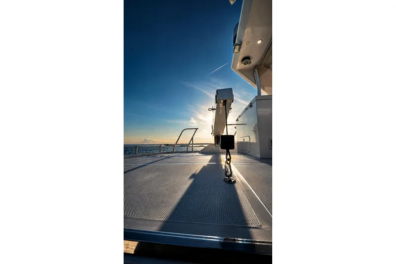 Slide: The Image of Sunset view from the deck of a 2005 Symbol 58 Pilothouse yacht. - 17