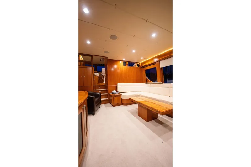 Slide: The Image of Luxurious interior of 2005 Symbol 58 Pilothouse yacht with elegant wood finishes. - 23