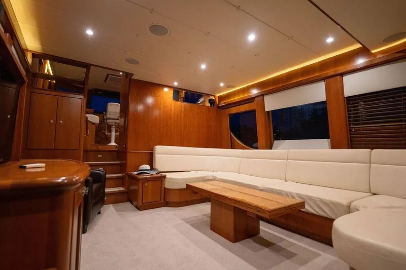Slide: The Image of Luxurious interior of a 2005 Symbol 58 Pilothouse yacht with elegant wood finishes. - 24