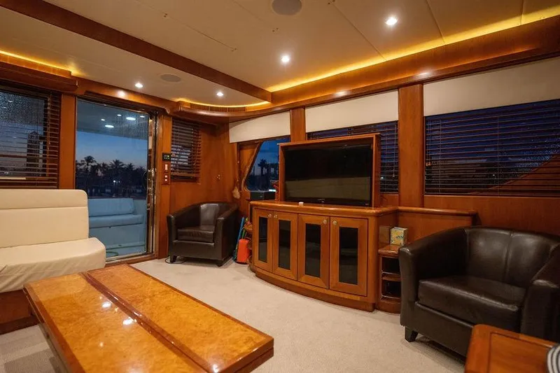 Slide: The Image of Luxurious interior of a 2005 Symbol 58 Pilothouse yacht with elegant wood finishes. - 26