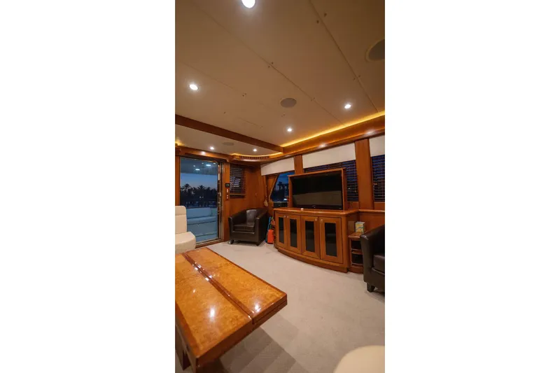 Slide: The Image of Luxurious interior of a 2005 Symbol 58 Pilothouse yacht with elegant wood finishes. - 32