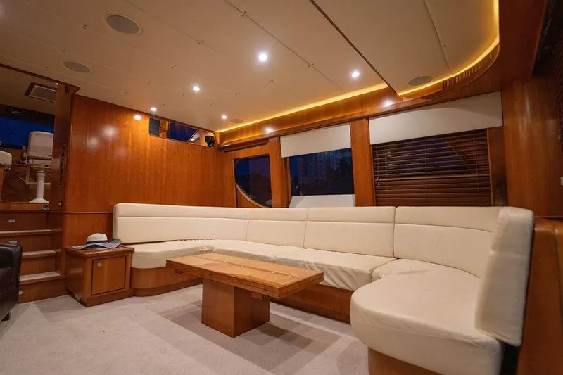 Slide: The Image of Luxurious interior of a 2005 Symbol 58 Pilothouse yacht with elegant wood finishes. - 34