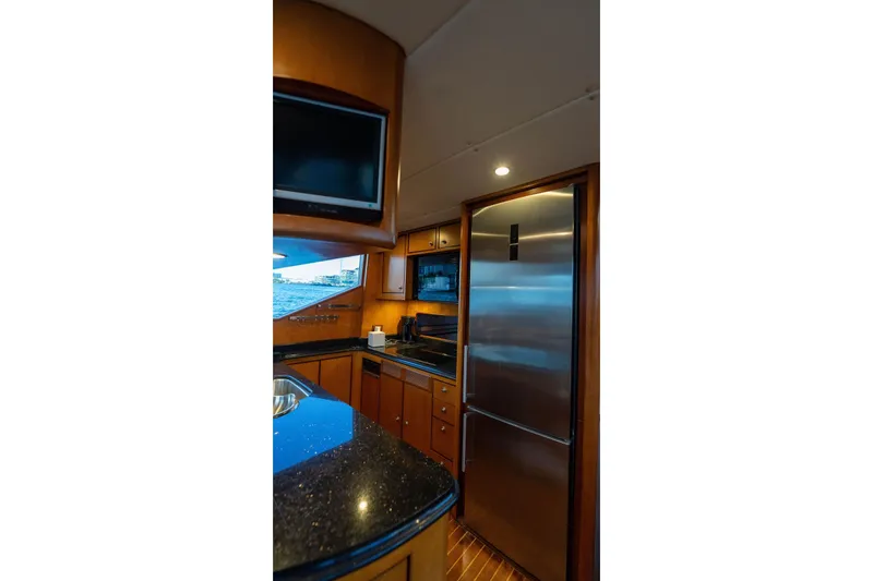 Slide: The Image of Luxurious kitchen interior of 2005 Symbol 58 Pilothouse yacht with modern appliances. - 35