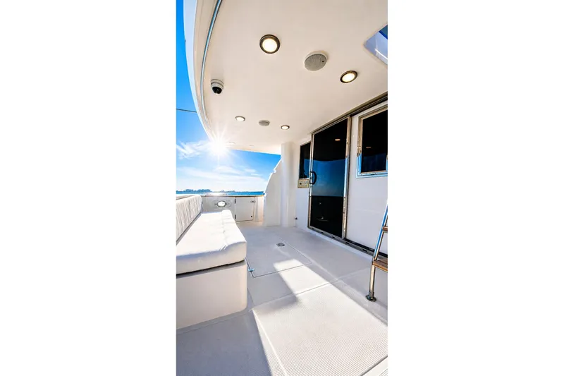 Slide: The Image of Spacious deck of 2005 Symbol 58 Pilothouse yacht under bright sunlight. - 48