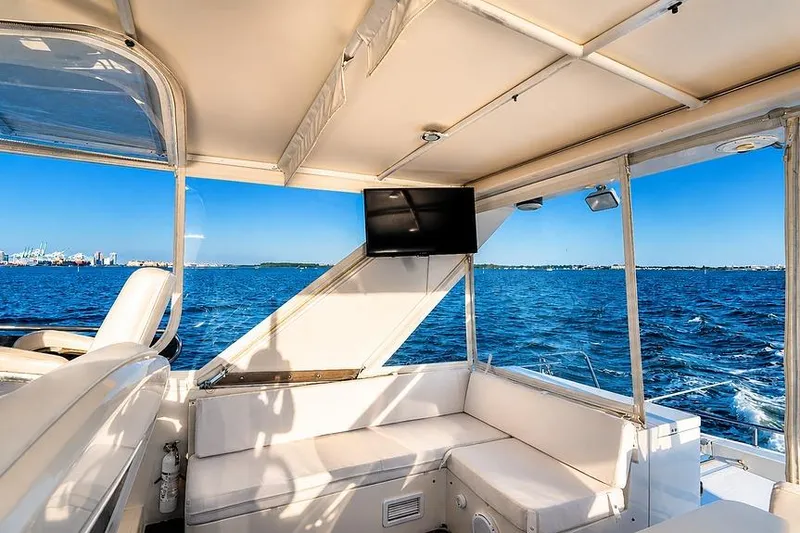 Slide: The Image of Luxurious interior of 2005 Symbol 58 Pilothouse yacht with ocean view. - 58