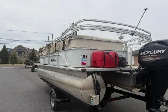 Slide: The Image of 2016 SunChaser Oasis Fish 820 Cruise-N-Fish pontoon boat with Mercury outboard motor. - 4