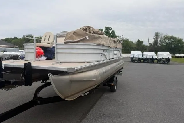 Slide: The Image of 2016 SunChaser Oasis Fish 820 Cruise-N-Fish pontoon boat on trailer in parking lot. - 5