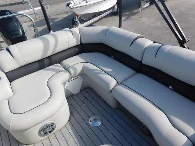Slide: The Image of Interior of a 2020 Avalon Ambassador Funship 27' with gray upholstery. - 10