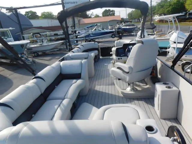 Slide: The Image of Luxurious Avalon Ambassador Funship 27' pontoon boat, 2020 model, featuring elegant seating. - 14