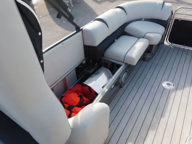 Slide: The Image of Interior of 2020 Avalon Ambassador Funship 27' with seating and storage. - 18