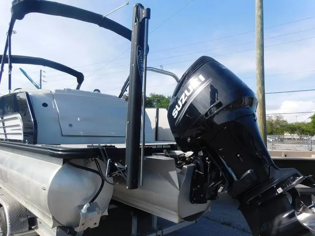 Slide: The Image of 2020 Avalon Ambassador Funship 27' with Suzuki outboard motor. - 3