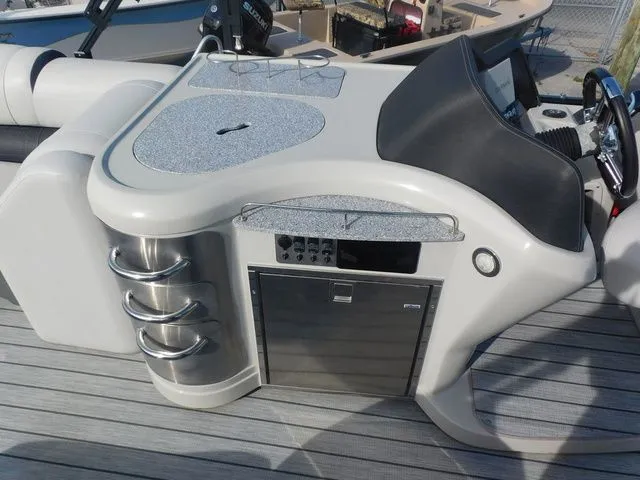 Slide: The Image of 2020 Avalon Ambassador Funship 27' helm with stainless steel features. - 7