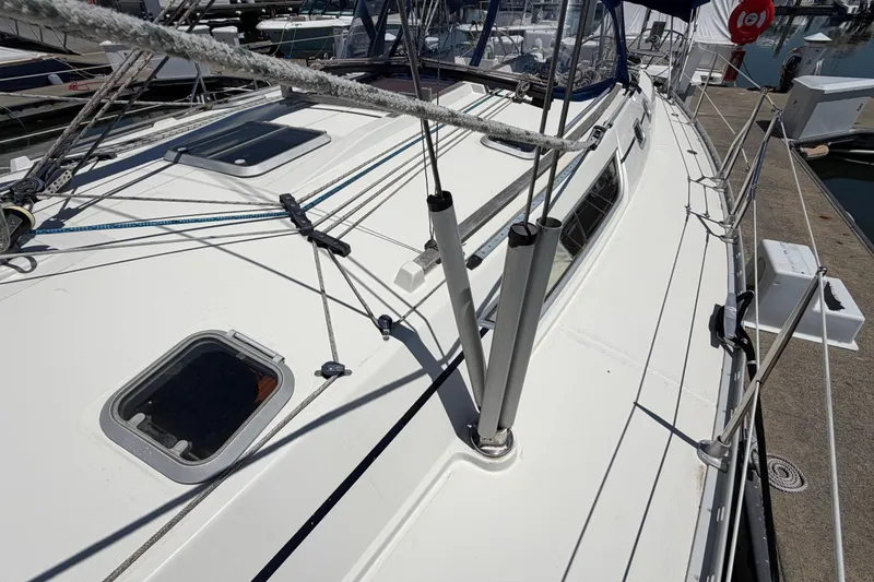 Slide: The Image of Jeanneau Sun Odyssey 45.2 sailboat deck, 1998 model, docked at marina. - 12
