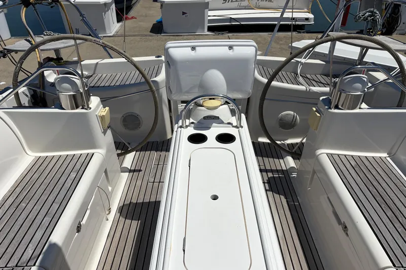 Slide: The Image of Cockpit of 1998 Jeanneau Sun Odyssey 45.2 sailboat with dual steering wheels. - 15