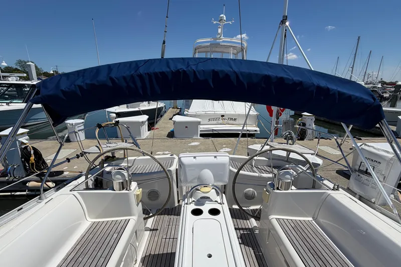 Slide: The Image of Cockpit view of 1998 Jeanneau Sun Odyssey 45.2 sailboat docked at marina. - 16