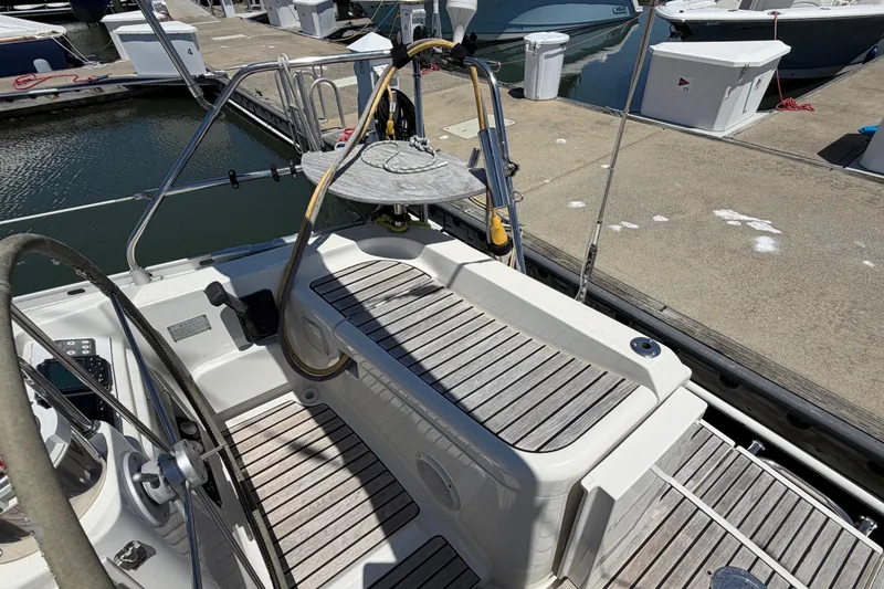 Slide: The Image of Jeanneau Sun Odyssey 45.2 sailboat deck, 1998 model, docked at marina. - 17