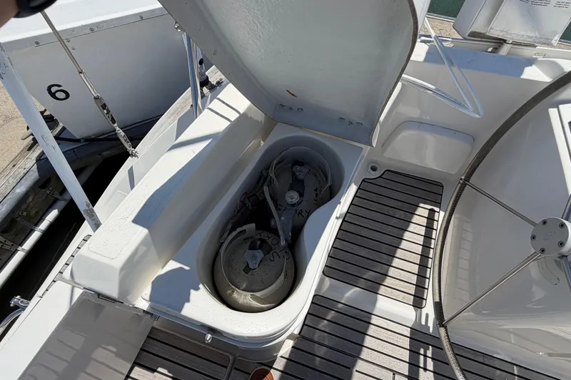 Slide: The Image of Open storage compartment on 1998 Jeanneau Sun Odyssey 45.2 sailboat deck. - 20