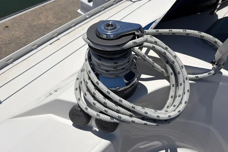 Slide: The Image of Winch and rope on 1998 Jeanneau Sun Odyssey 45.2 sailboat deck. - 28