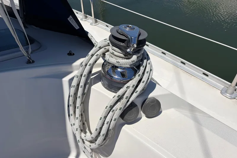 Slide: The Image of Winch and rope on 1998 Jeanneau Sun Odyssey 45.2 sailboat deck. - 29