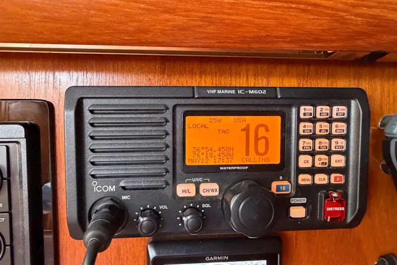 Slide: The Image of VHF marine radio on Jeanneau Sun Odyssey 45.2, 1998 model, displaying channel 16. - 46
