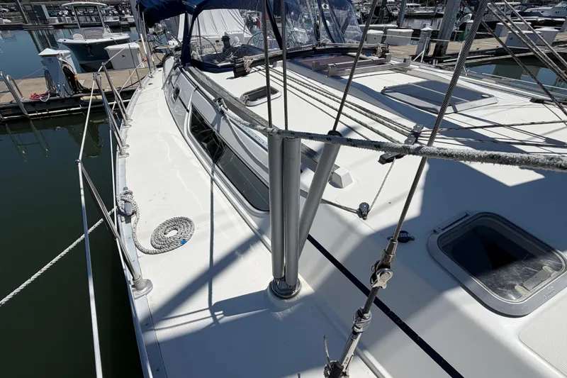 Slide: The Image of Jeanneau Sun Odyssey 45.2 sailboat deck, 1998 model, docked at marina. - 8