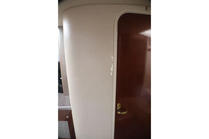 Slide: The Image of Interior view of a 2003 Formula 400 Super Sport yacht cabin door. - 11