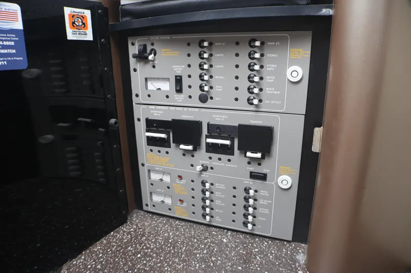 Slide: The Image of Control panel of a 2003 Formula 400 Super Sport boat, featuring various switches and indicators. - 24