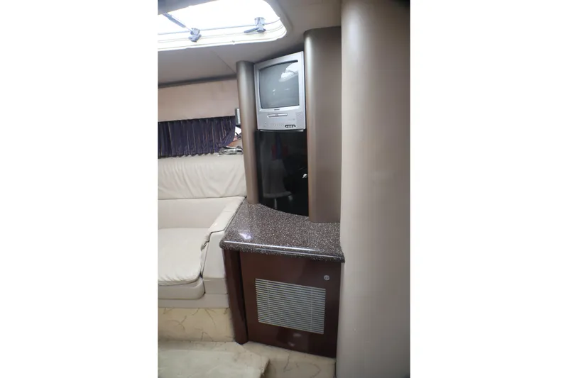 Slide: The Image of Interior of 2003 Formula 400 Super Sport yacht with TV and seating area. - 34