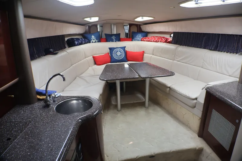 Slide: The Image of Luxurious interior of a 2003 Formula 400 Super Sport yacht with plush seating and kitchenette. - 35