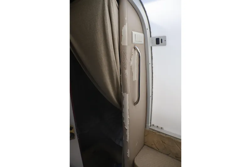 Slide: The Image of Interior cabin door of a 2003 Formula 400 Super Sport boat. - 36
