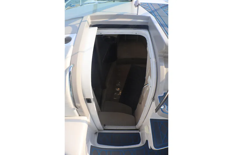 Slide: The Image of 2003 Formula 400 Super Sport cabin entrance with open door and sleek design. - 38