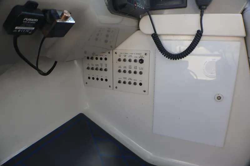 Slide: The Image of Control panel of a 2003 Formula 400 Super Sport boat interior. - 41
