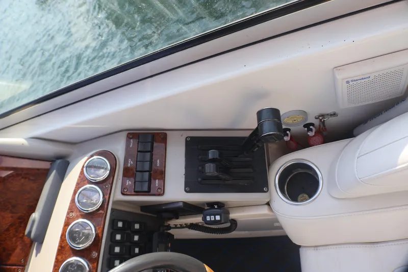Slide: The Image of Control panel of a 2003 Formula 400 Super Sport boat with gauges and switches. - 45