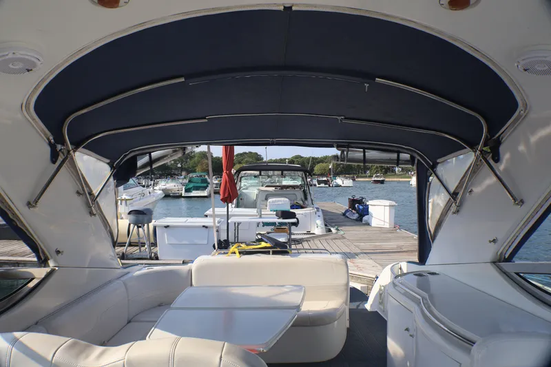 Slide: The Image of Interior view of a 2003 Formula 400 Super Sport yacht docked at a marina. - 47