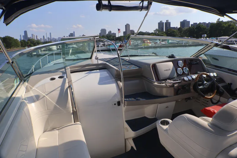 Slide: The Image of 2003 Formula 400 Super Sport boat interior with city skyline in the background. - 48