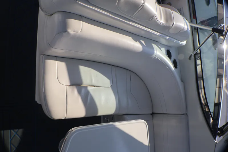 Slide: The Image of 2003 Formula 400 Super Sport boat interior with white leather seating. - 51