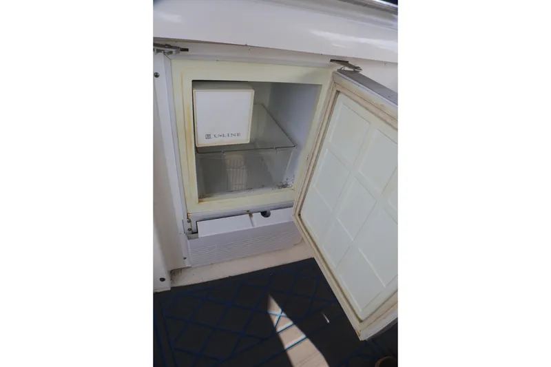 Slide: The Image of Open U-Line refrigerator on 2003 Formula 400 Super Sport boat. - 52