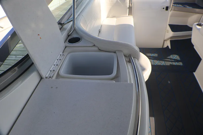 Slide: The Image of Interior of 2003 Formula 400 Super Sport boat with seating and storage compartment. - 54