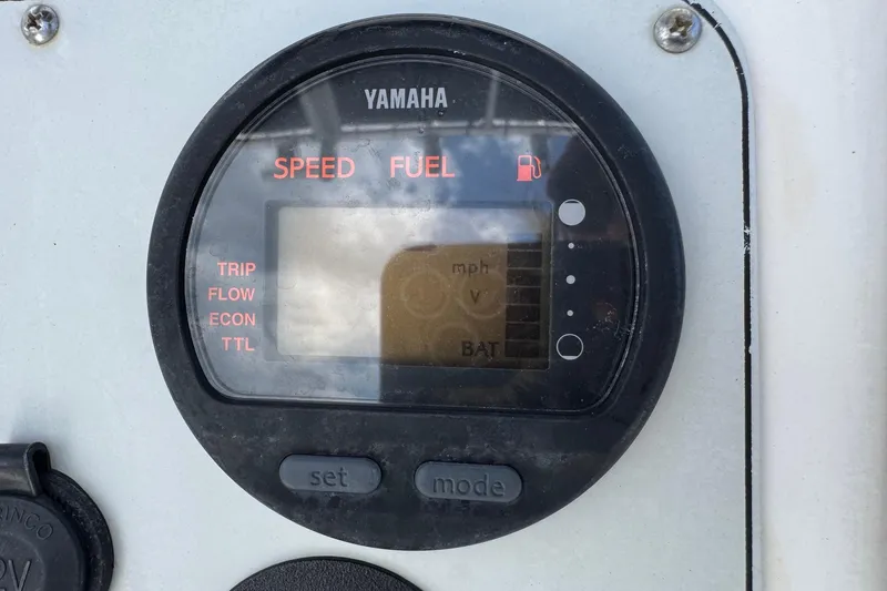 Slide: The Image of Yamaha speed and fuel gauge on 2011 Tidewater 230 CC Adventure boat. - 13
