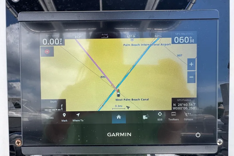 Slide: The Image of Garmin GPS display on 2011 Tidewater 230 CC Adventure, showing West Palm Beach Canal map. - 15